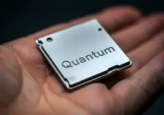 a computer chip and Quantum written on it, quantum computer