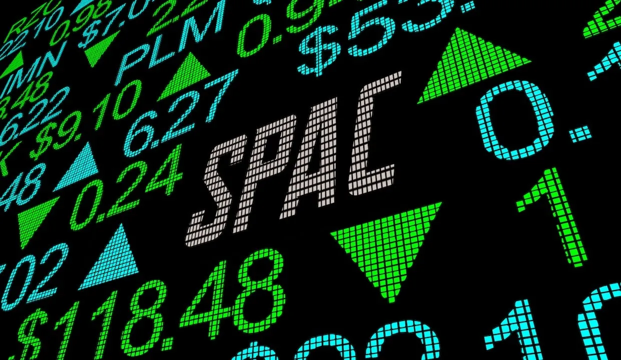 The image shows a digital stock ticker with the word "SPAC" highlighted among green arrows, symbolizing the fluctuating prices in the stock market.