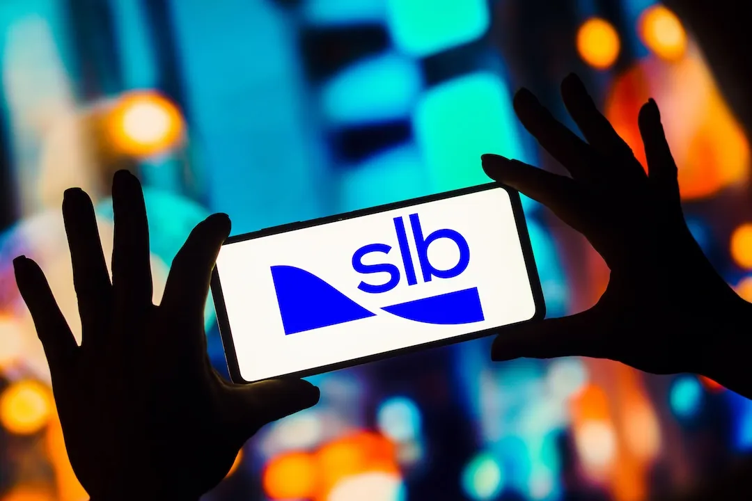 In this photo illustration, the Schlumberger (SLB) logo is displayed on a smartphone screen.