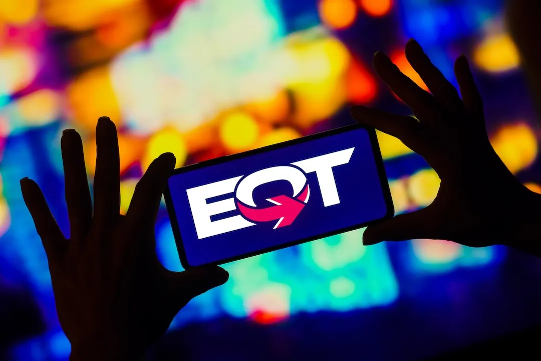 In this photo illustration, the EQT Corporation logo is displayed on a smartphone screen.