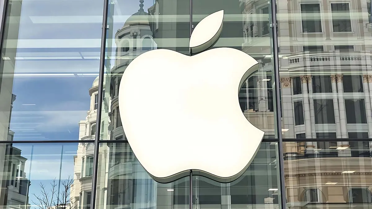 Apple Inc Stock - Apple Logo on glass with reflection