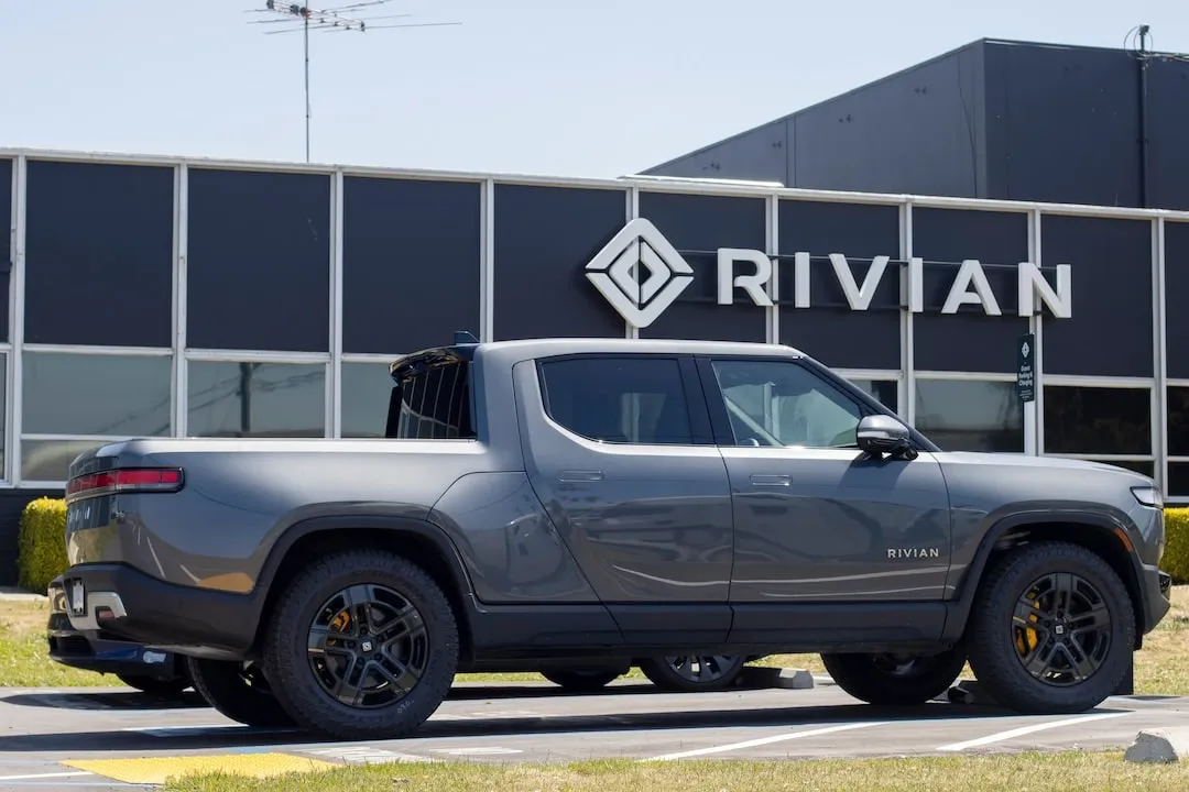 A new Rivian R1T truck is seen at a Rivian service center in South San Francisco, California. Rivian Automotive, Inc. is an electric vehicle automaker.