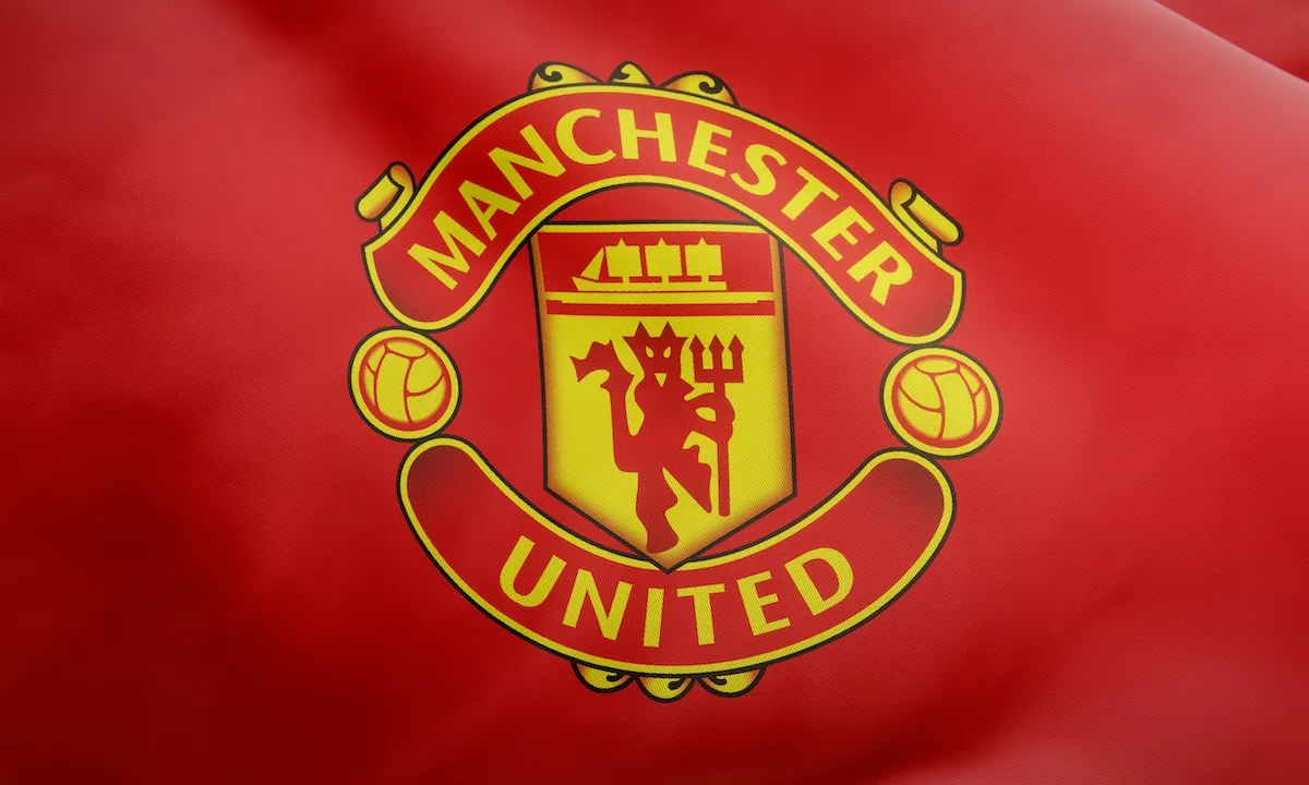 Manchester United Logo on red flag background MANU