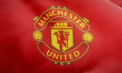 Manchester United Logo on red flag background MANU