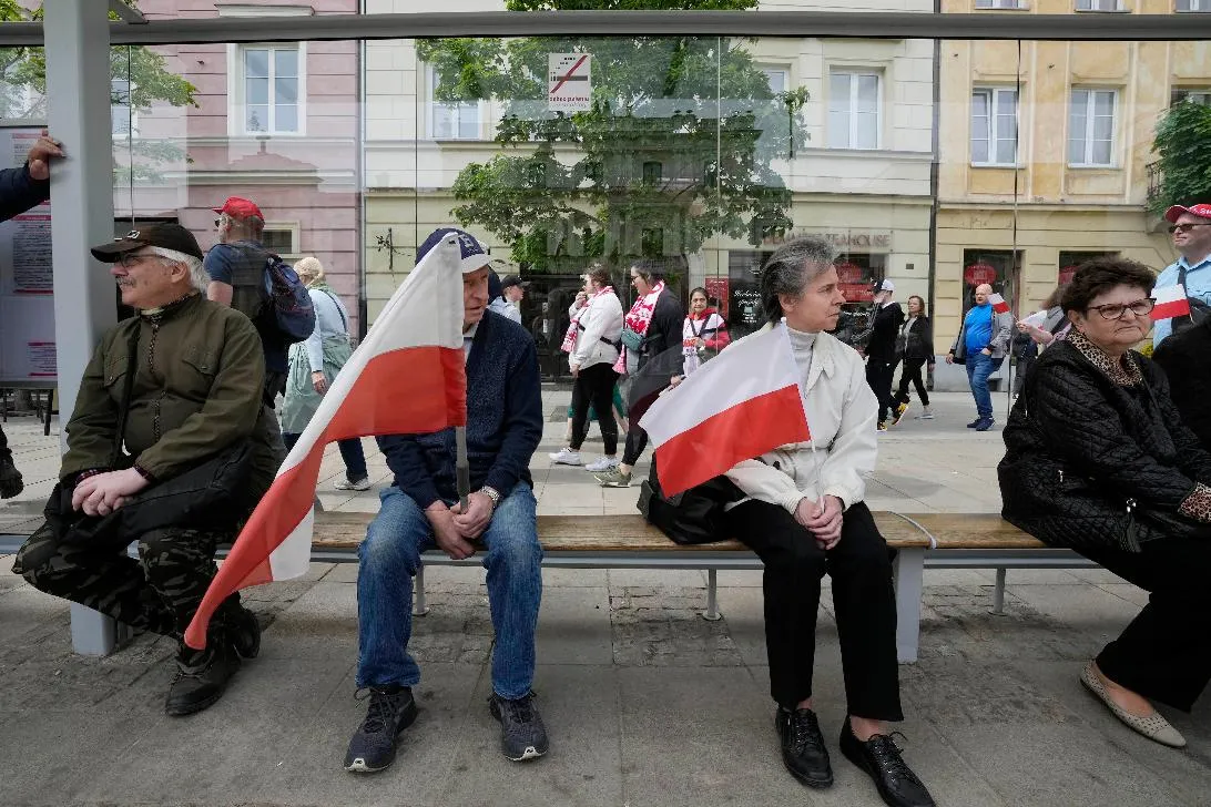 9c706b903d4c43fa86893c875df7d113_main_poland_protest_77633