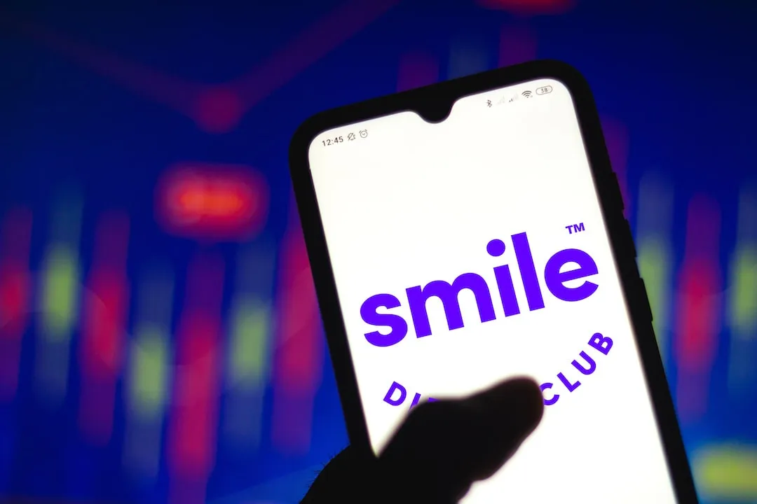 In this photo illustration the SmileDirectClub logo seen displayed on a smartphone.