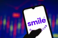 In this photo illustration the SmileDirectClub logo seen displayed on a smartphone.