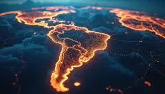 Illuminated world map with glowing pathways connects cities in Latin America. Digital marketing reach, global connection. Represents business expansion, international strategy, online connectivity,