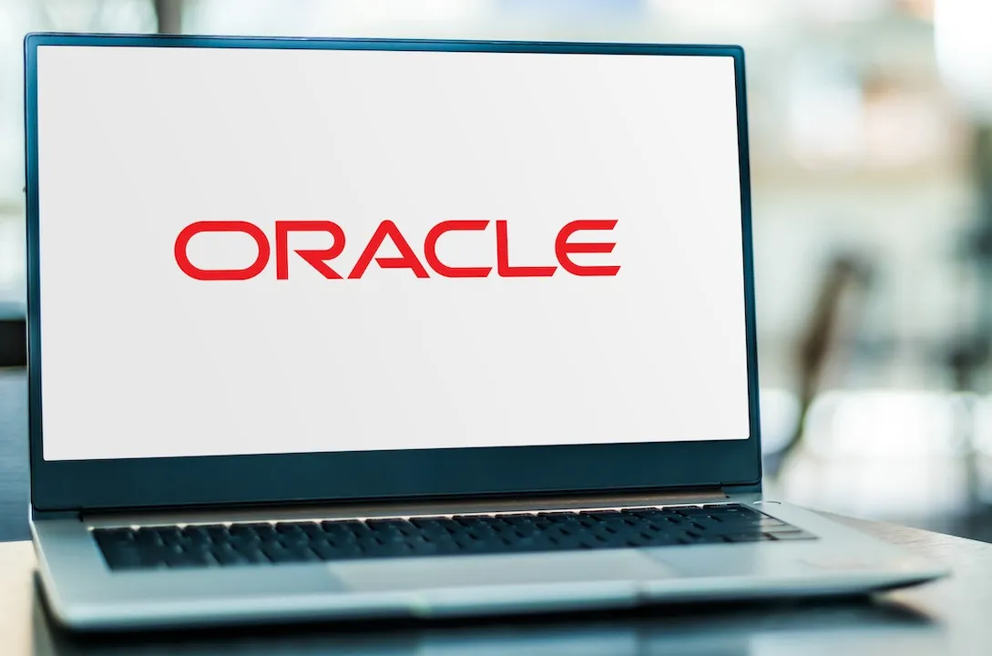 Laptop computer displaying logo of Oracle Corporation
