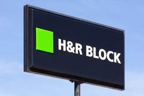 H&R Block logo on black sign
