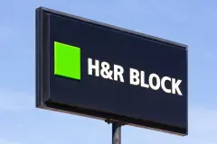 H&R Block logo on black sign