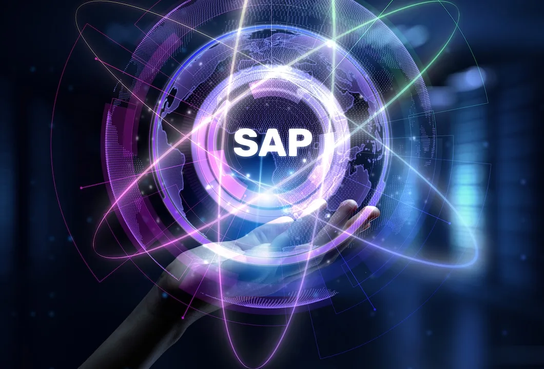 a hand holding a glowing, futuristic digital sphere with the word "SAP" prominently displayed at the center, symbolizing advanced technology and global connectivity