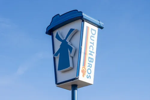Closeup of the Dutch Bros sign outside one of its drive-through coffee shops in Sandy, Oregon.