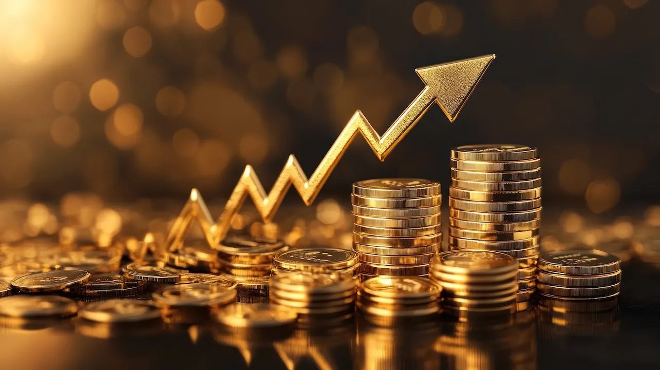 Gold coins stacks with upward trend, business growth, financial success