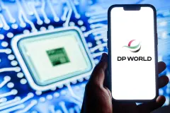 DP World Logo on smartphone computer chip behind