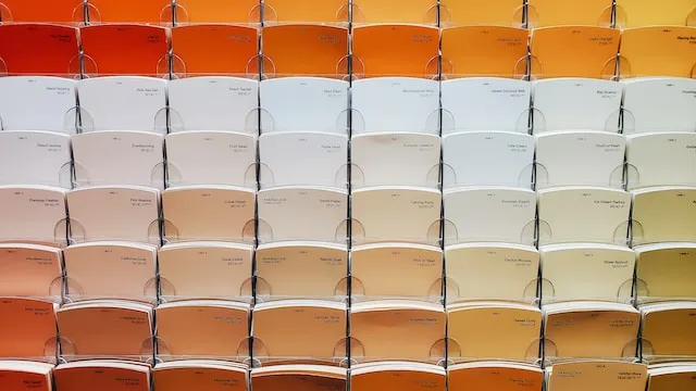 Home Depot color chat swatches in orange cream and white