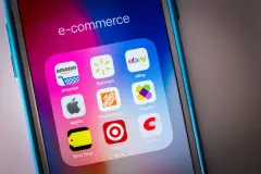 Wayfair app among other apps on smartphone Etsy Apple Amazon etc