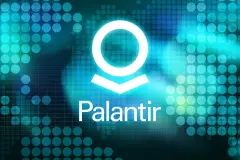 White Palantir Logo on glowing turquoise and green background