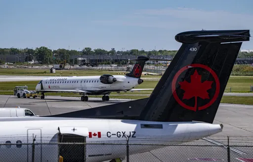 0ea6f68268404974a9fa0e0acac80b22_preview_air_canada_strike_passengers_94611
