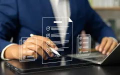 Electronic signature concept, E-signing, Business man using stylus pen signing contract electronic document on laptop