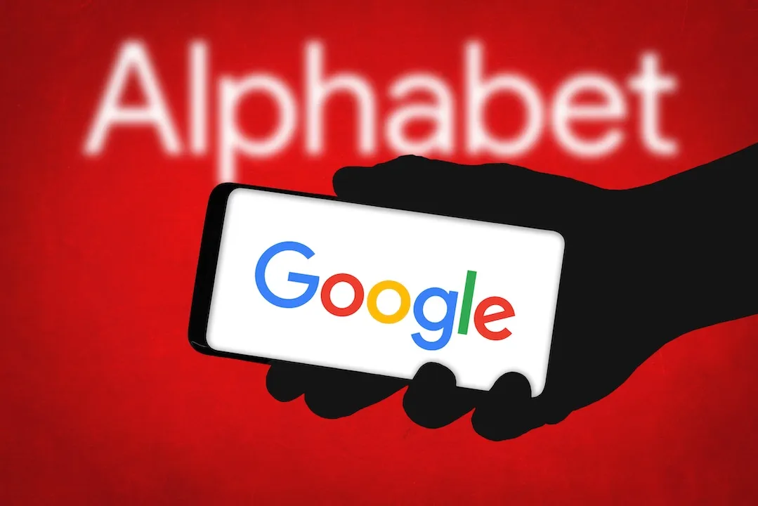 Alphabet text on Red backdrop. Google Logo on Smartphone