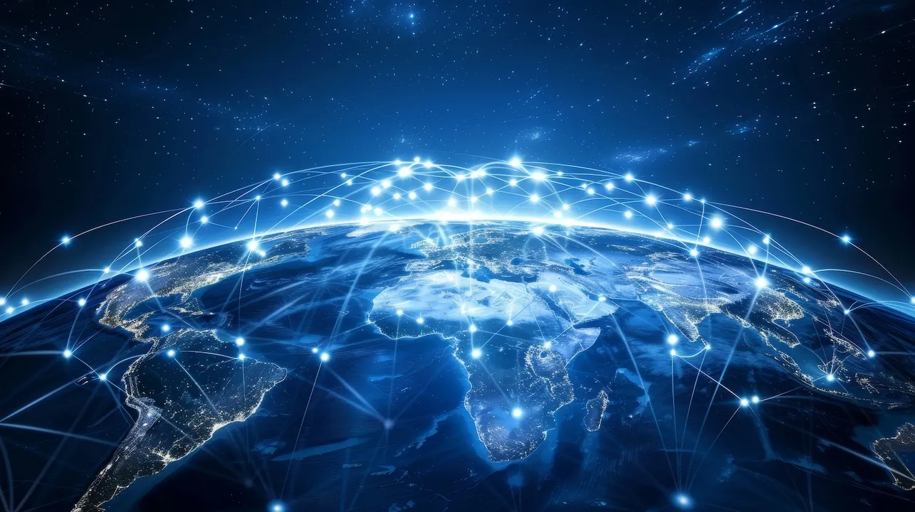 This image showcases the Earth's surface at night, highlighting a global network with bright connections representing connectivity around the world.