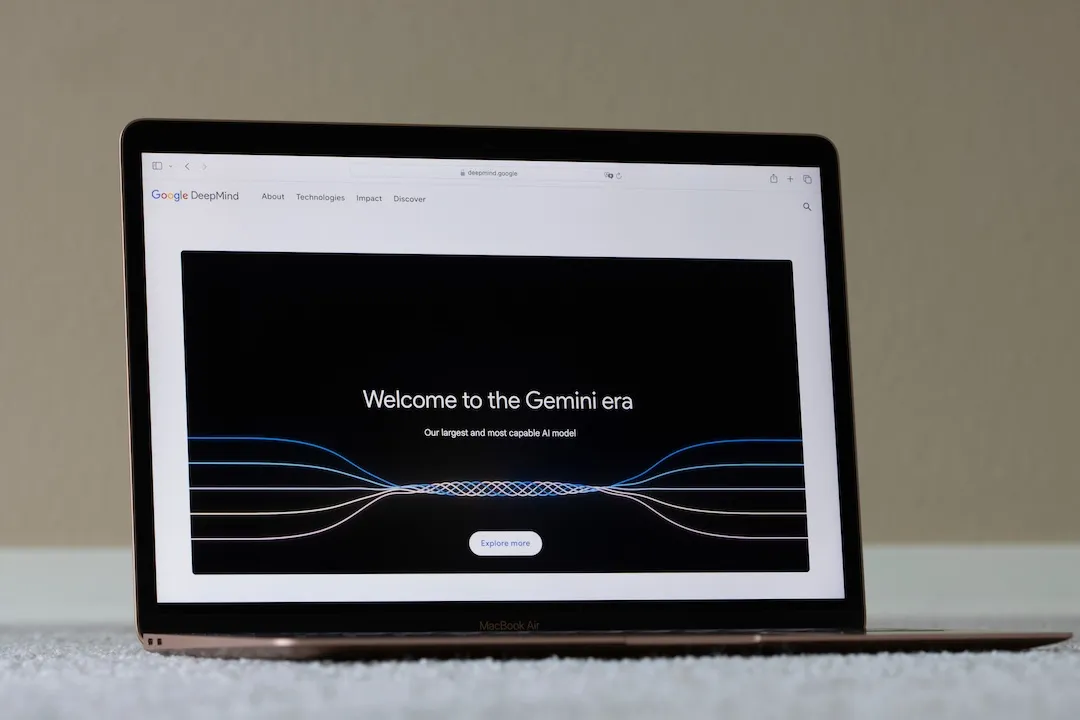 Webpage of Google's Gemini is seen on a MacBook Air laptop. Google launches its "largest and most capable" AI model, Gemini, to rival OpenAI's GPT-4.