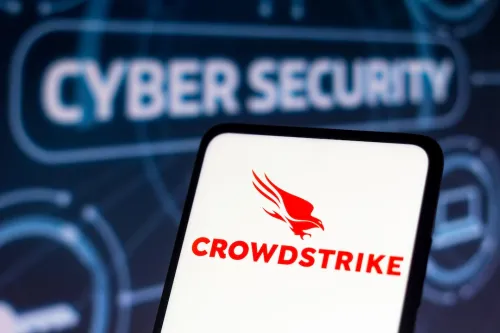 Crowdstrike logo on smartphone with Cyber Security written in the background.