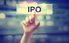 Finger pointing at IPO sign