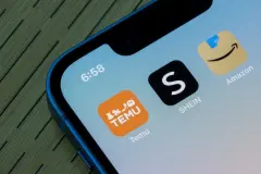 Amazon (AMZN) App next to Shein Temu on Smartphone Fast Fashion