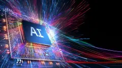 The image displays a circuit board with an "AI" chip at its center, surrounded by bursts of colorful light beams, symbolizing fast data processing and the dynamic nature of artificial intelligence tec...