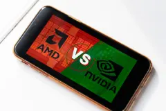 AMD Vs NVDA logos on red and green smartphone screen