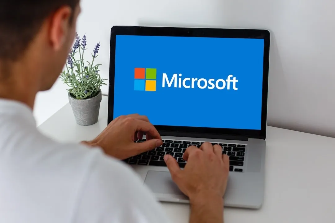 Notebook with Microsoft Windows 10 logo. Operating systems developed by Microsoft