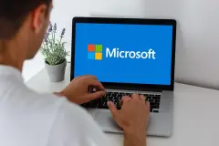 Notebook with Microsoft Windows 10 logo. Operating systems developed by Microsoft