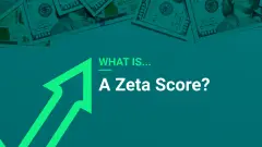 What is a Zeta Score? appears in writing on a green background with dollar bills above.