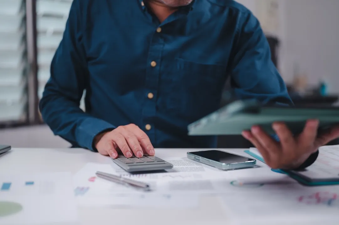 Person Analyzing Financial Data