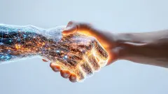 Digital transformation handshake with glowing network effect, one hand made of technology particles and light streams connecting with human hand on black background