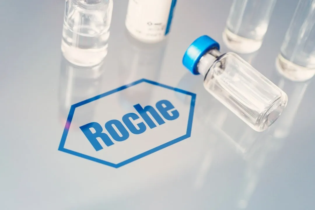 Roche Logo next to test bottles
