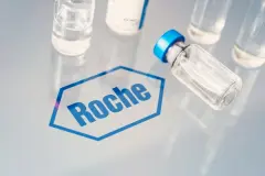 Roche Logo next to test bottles