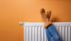 Cosy Socks on Feet up on Radiator