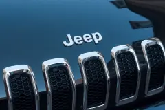 Silver Jeep Badge on Hood with grill