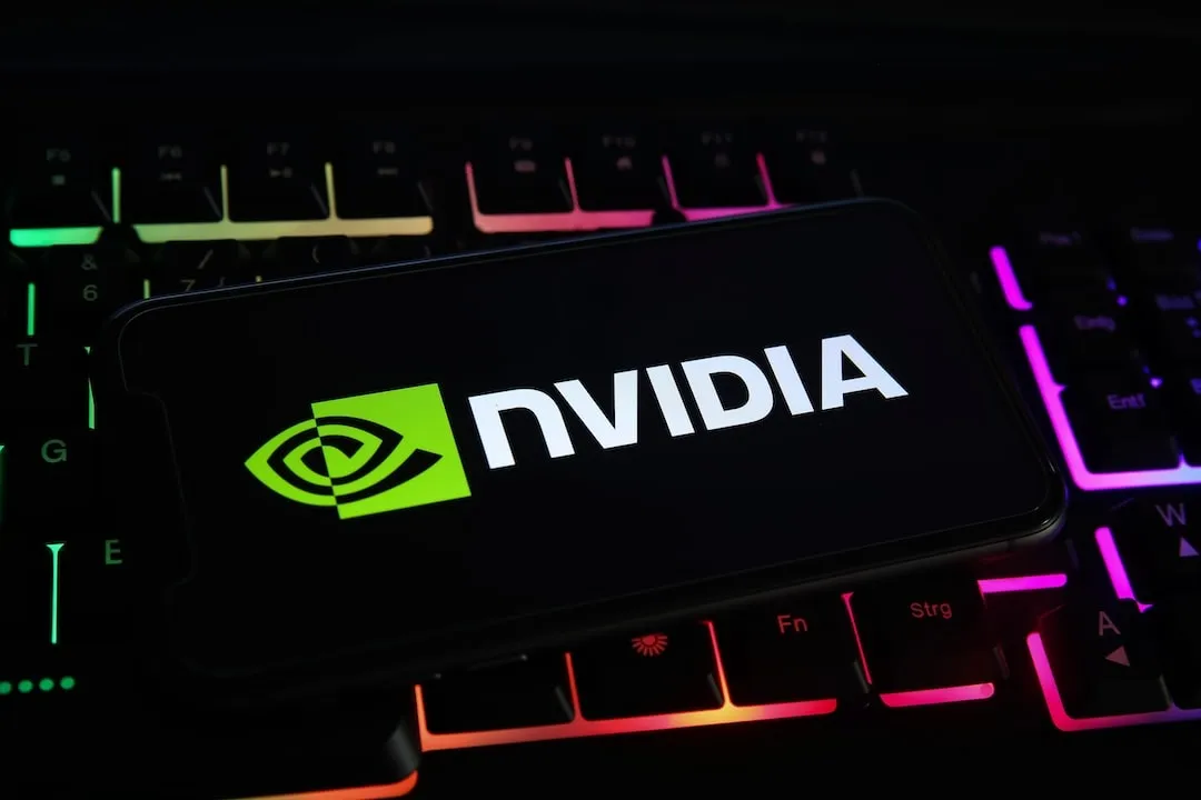 Nvidia Logo on smartphone on colourful backlit keyboard