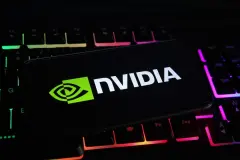 Nvidia Logo on smartphone on colourful backlit keyboard